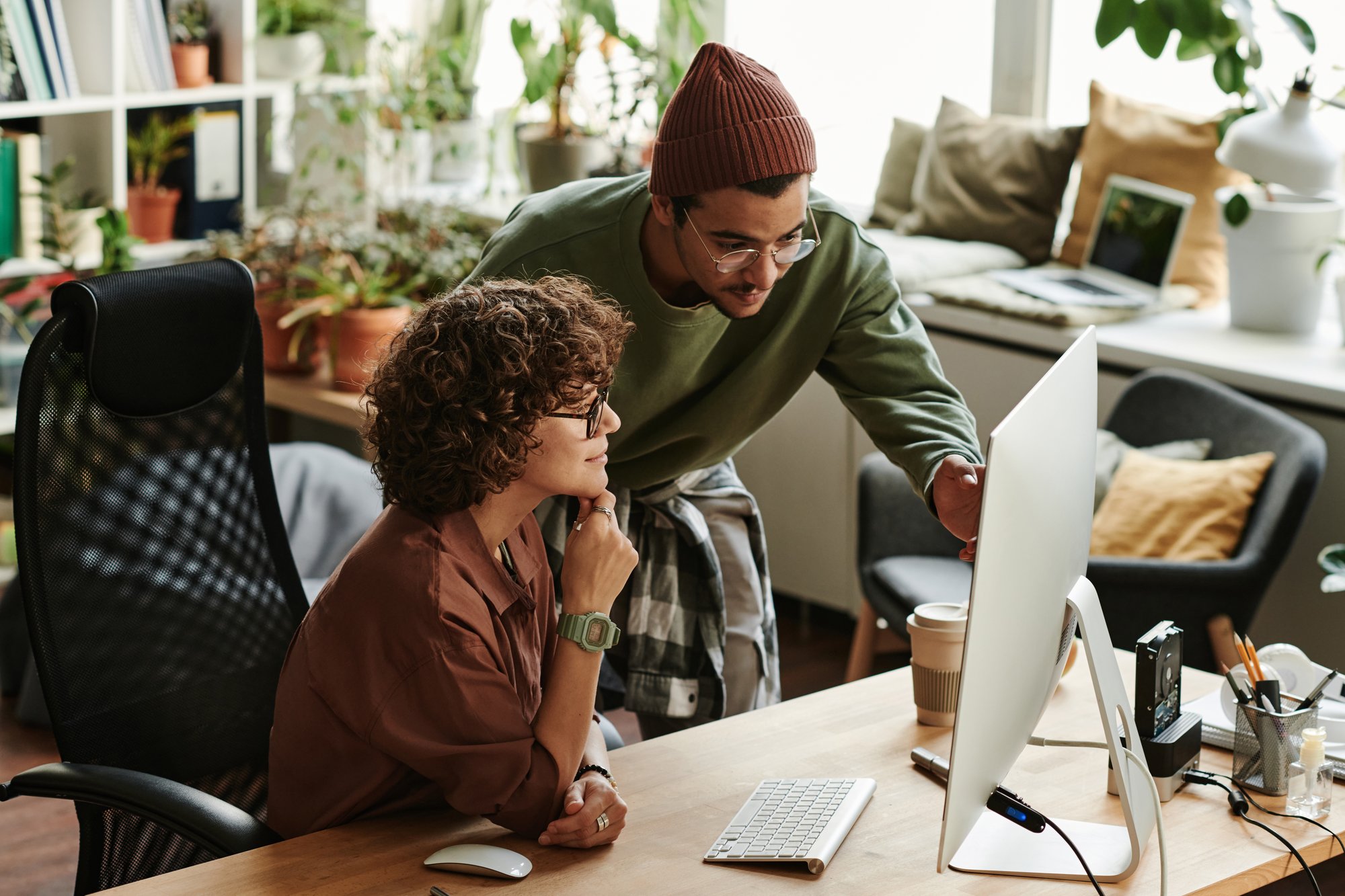 Confident Male IT Support Manager Making Presentation or Report