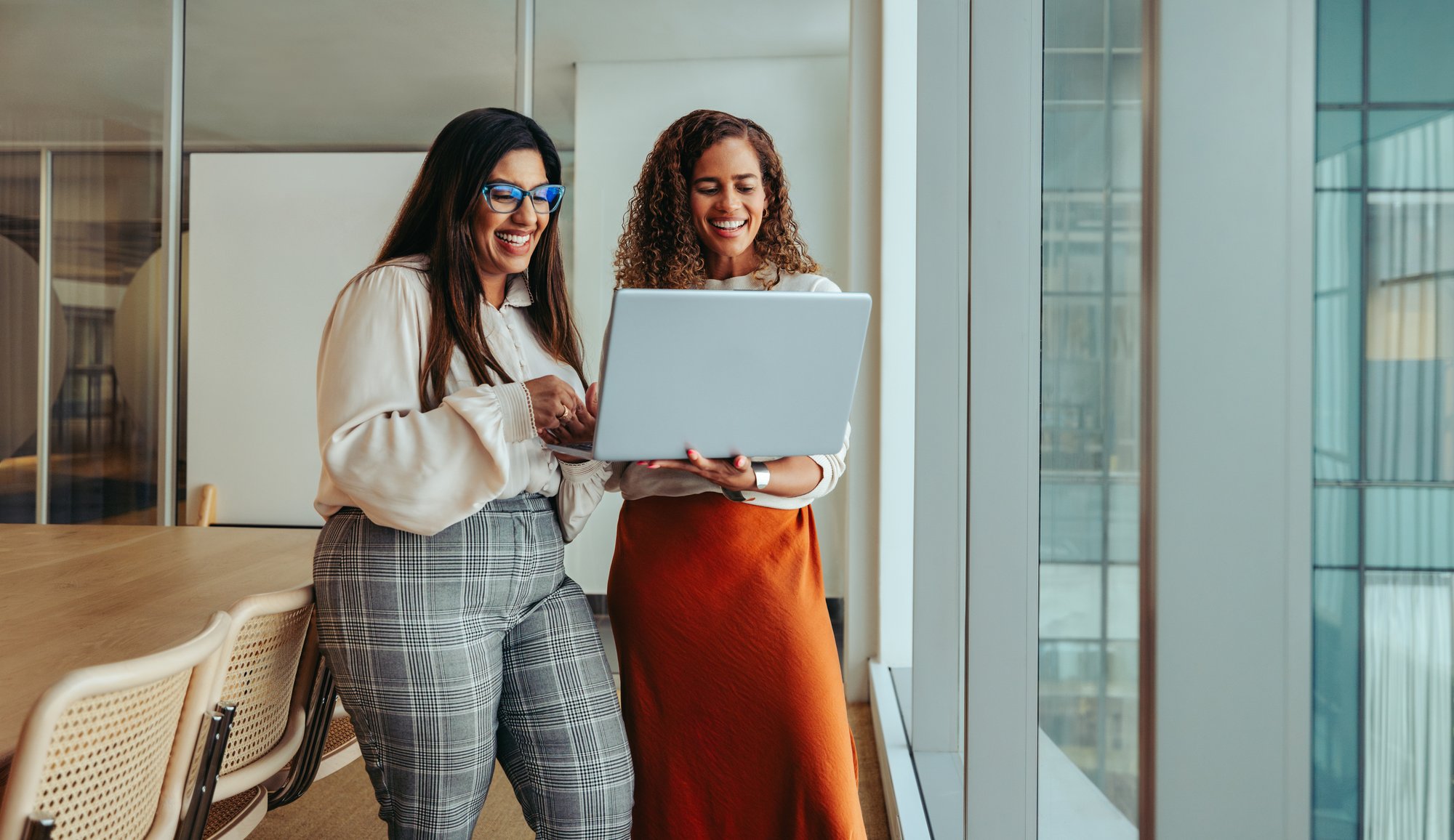 Young Professionals Collaborating in a Modern Tech Startup Offic